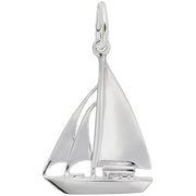 The Rembrandt Charms Sailboat Cutter Charm in sterling silver is shaped like a sleek sailboat, with detailed sails and hull. This minimalist, elegant pendant features a loop at the top for easy attachment to a chain or bracelet.