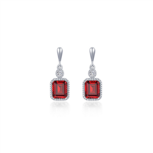 The Lafonn JAN sim diamond, garnet earrings feature rectangular red garnets framed by sparkling sim diamonds, each dangling from a round clear stone on a sleek silver hook.