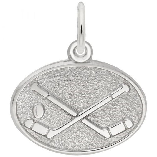 A detailed image of the Sterling Silver Hockey Oval Disc Charm by Rembrandt Charms. This charm features a polished oval disc with an intricately detailed hockey design, measuring 0.76 inches by 0.55 inches (19.29 mm by 13.97 mm). The charm has a sleek sterling silver finish, perfect for adding a touch of sporty elegance to any charm bracelet or necklace. Style number 3404.