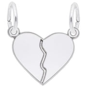 'Sterling silver break apart heart charm with a jagged split down the middle. Style 8357, 0.66 in x 0.6 in (16.76 mm x 15.28 mm).'