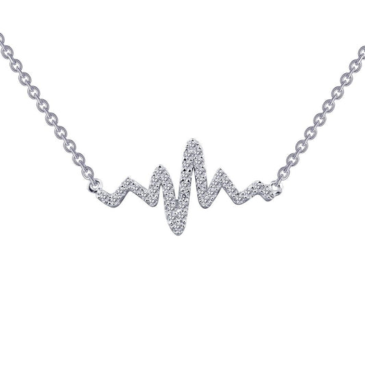 The Heartbeat Necklace by Lafonn is a sterling silver necklace featuring a pendant in the shape of a heartbeat line, adorned with small, sparkling diamonds. The pendant is attached at two points to a delicate silver chain, making it the perfect accessory for an elegant touch.