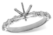 An Allison Kaufman semi set engagement ring in 14k white gold with a 2ct head, prong setting for a center stone, and 0.50ct of round diamonds along the band.