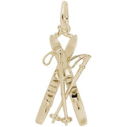 The Rembrandt Charms Downhill Skis With Poles Charm, crafted in 14K yellow gold, features a detailed design of crossed skis and ski poles. The high-quality charm showcases intricate details such as the bindings and loops on the poles, enhancing its realistic appearance. It includes a small loop at the top for easy attachment to a chain.