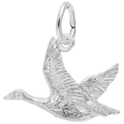 The Rembrandt Charms Canadian Goose Charm is crafted from sterling silver and features detailed feathers and outstretched wings. The charm includes a small circular loop for easy mounting on a necklace or bracelet.