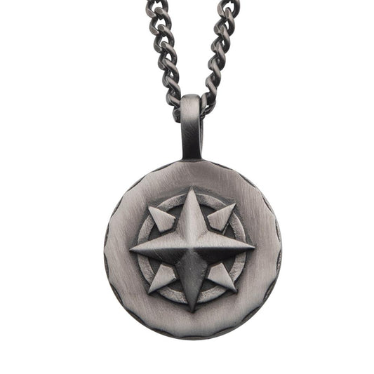 The Gun Metal IP Compass Medallion Pendant with Chain by INOX features a circular medallion adorned with a prominent raised eight-point star at the center. It boasts a weathered, antique finish and is Gun Metal Plated for a rugged, timeless look.