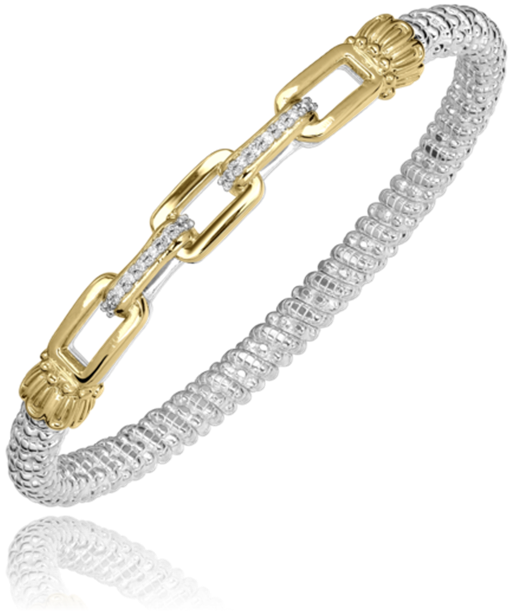 Introducing a stunning bracelet by Alwand Vahan Jewelry: a two-tone piece that seamlessly blends a braided sterling silver band, measuring 4mm, with a central section of intricately designed 14k gold links. Accented by small diamonds totaling 0.11 carats, this bracelet masterfully combines intricate textures and elegant design elements for a luxurious and sophisticated look.