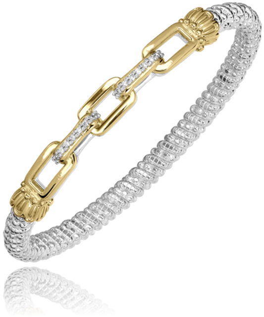 Introducing a stunning bracelet by Alwand Vahan Jewelry: a two-tone piece that seamlessly blends a braided sterling silver band, measuring 4mm, with a central section of intricately designed 14k gold links. Accented by small diamonds totaling 0.11 carats, this bracelet masterfully combines intricate textures and elegant design elements for a luxurious and sophisticated look.