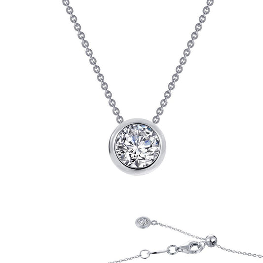 Introducing the Solitaire Slider Necklace by Lafonn: A classic piece featuring a single round diamond pendant elegantly set in a bezel setting. This exquisite necklace is crafted from sterling silver and comes with an adjustable chain that includes a small diamond detail near the clasp. The delicate and elegant chain beautifully enhances the central diamond's brilliance.