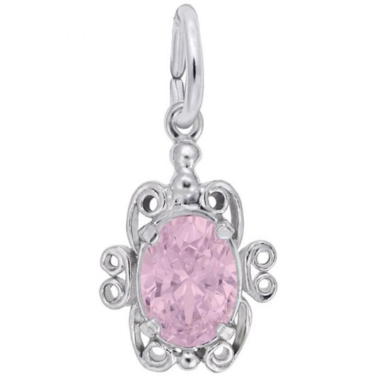 A sterling silver pendant in the shape of a turtle, featuring an ornate design with intricate filigree details. At the center, an oval-shaped pink gemstone, representing the 10 October Birthstone Charm in Sterling Silver by Rembrandt Charms, is set as the turtle's shell. The pendant includes a loop at the top for attaching to a chain.
