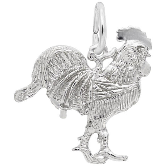 A radiant sterling silver Rooster Charm from the Rembrandt Charms collection features intricate details, including delicate feathers, a prominent crest, and finely crafted feet. This charming piece includes a small loop at the top for easy attachment to a necklace or bracelet. The rooster is artfully depicted standing while facing to the right.