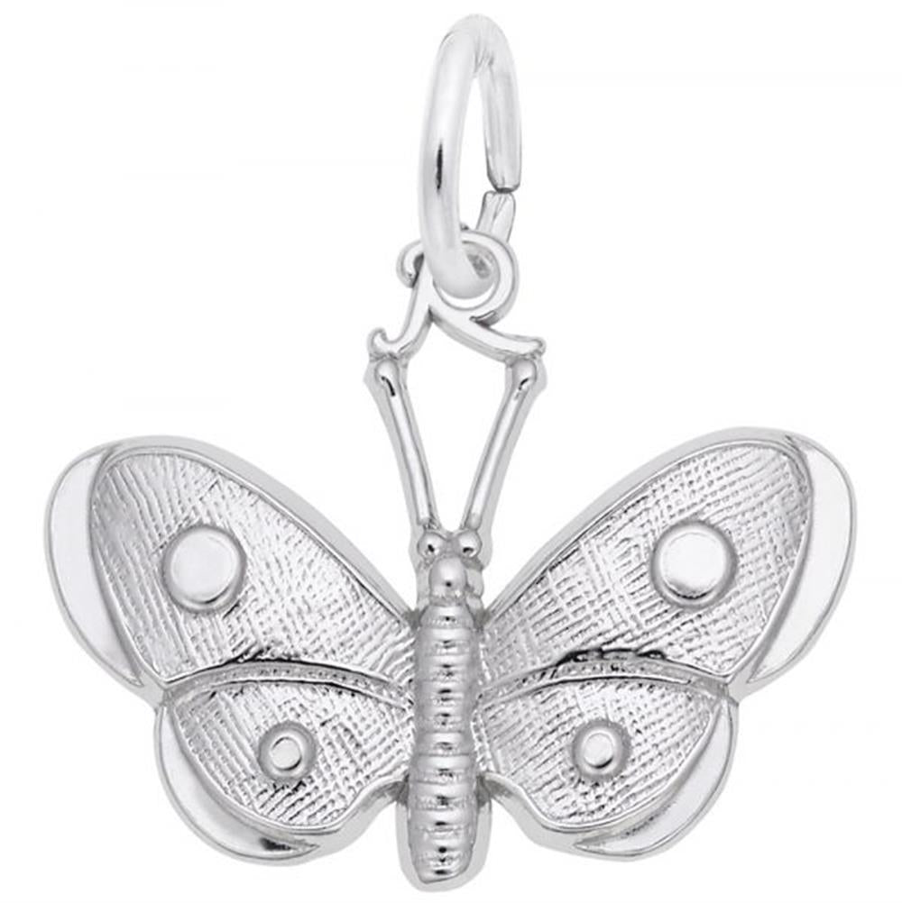 The Spotted Wings Butterfly Charm in sterling silver by Rembrandt Charms features an intricately detailed design with a textured pattern on the wings and body. It has a circular loop at the top for easy attachment to a chain or bracelet, with delicate etchings that add depth and dimension characteristic of Rembrandt Charms.