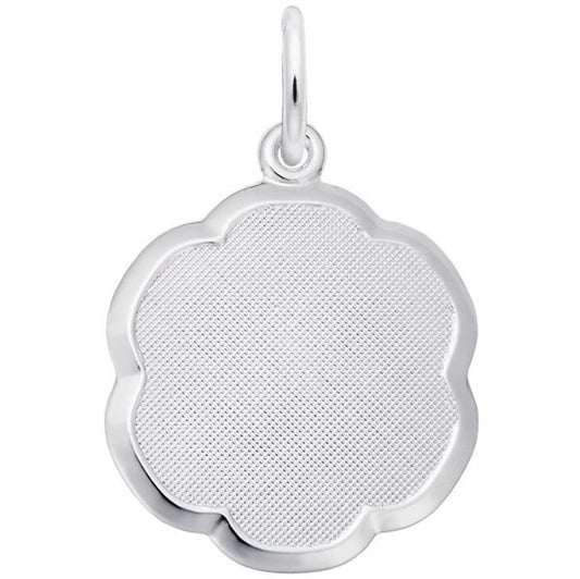 The Number Charm by Rembrandt Charms is a sterling silver pendant featuring a flower-shaped design with a textured inner surface and smooth outer edges. It includes a small loop at the top for easy attachment to a chain or cord.
