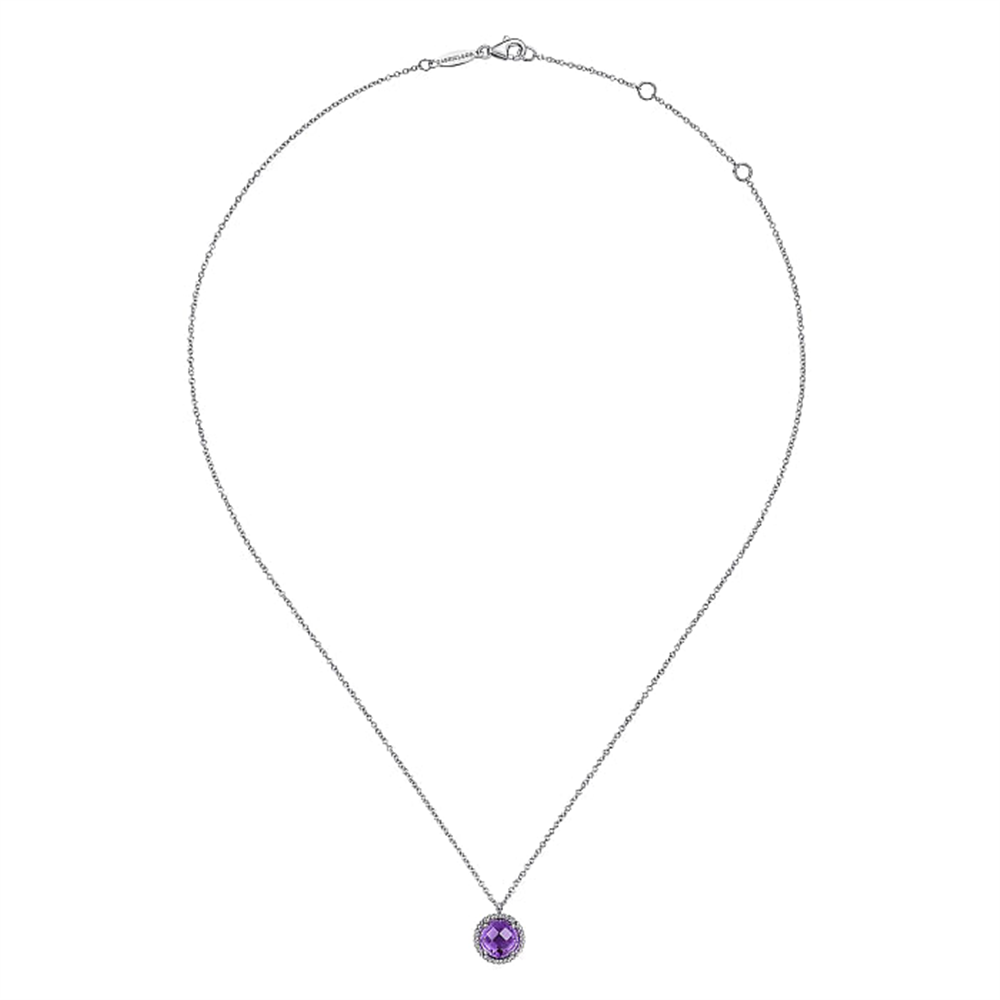 Introducing the 925 Sterling Silver Bujukan Amethyst Pendant Necklace by Gabriel & Co, Serial No: S1. This elegant piece features a round Amethyst stone pendant encased in a circular metal setting, all delicately suspended from a fine sterling silver chain. Part of the renowned Bujukan Collection, this necklace includes a small clasp and dual loops for adjustable length options.