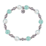 The Day by Day Collection- Aqua Agate Gemstone Bracelet by T Jazelle features alternating shiny silver and faceted aqua agate beads, plus a round "15" charm, part of the Day by Day Bracelet Collection.