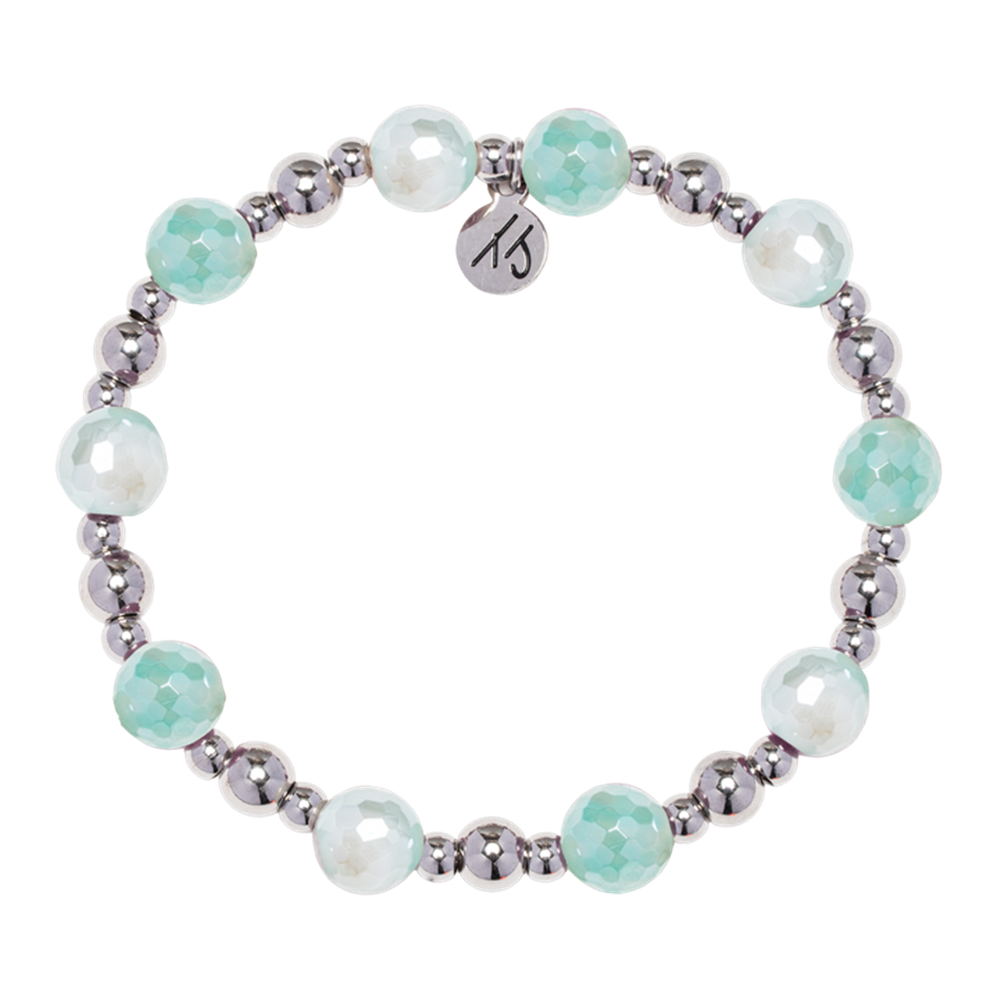 The Day by Day Collection- Aqua Agate Gemstone Bracelet by T Jazelle features alternating shiny silver and faceted aqua agate beads, plus a round "15" charm, part of the Day by Day Bracelet Collection.