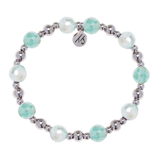 The Day by Day Collection- Aqua Agate Gemstone Bracelet by T Jazelle features alternating shiny silver and faceted aqua agate beads, plus a round "15" charm, part of the Day by Day Bracelet Collection.