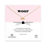 An image of a card showcases a gold dog bone necklace. The card prominently displays "WOOF" in GP-SS letters above the necklace, accompanied by a small heart and whiskers illustration. Additional text reads: "All you need is love and a dog. Wear your necklace as a reminder that your pooch is a true best friend!" The card also features the brand name "Dogeared.