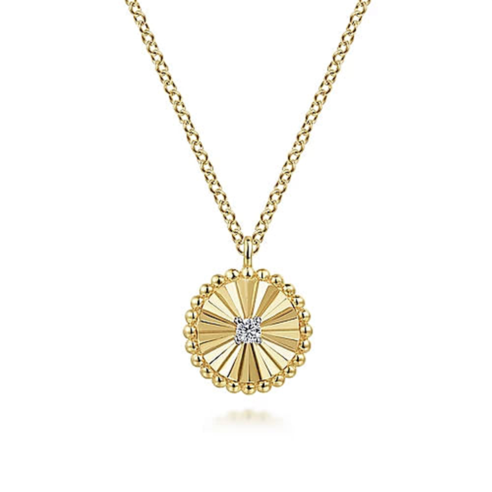 The Gabriel & Co 14K Gold Bujukan Diamond Pendant Necklace features a circular pendant with a textured, sunburst-like design and a central cluster of small diamonds. This pendant, part of the Bujukan Collection, is adorned with small gold beads along its edges and crafted from 14K white-yellow gold.