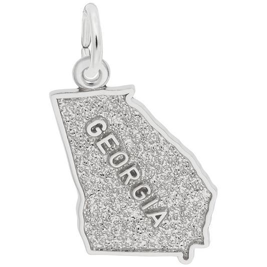 A Rembrandt Charms Georgia State Charm in sterling silver is displayed, exuding timeless beauty. The word "GEORGIA" is engraved in capital letters across the center of its textured design. This charm features a loop at the top for attaching to a necklace or bracelet.