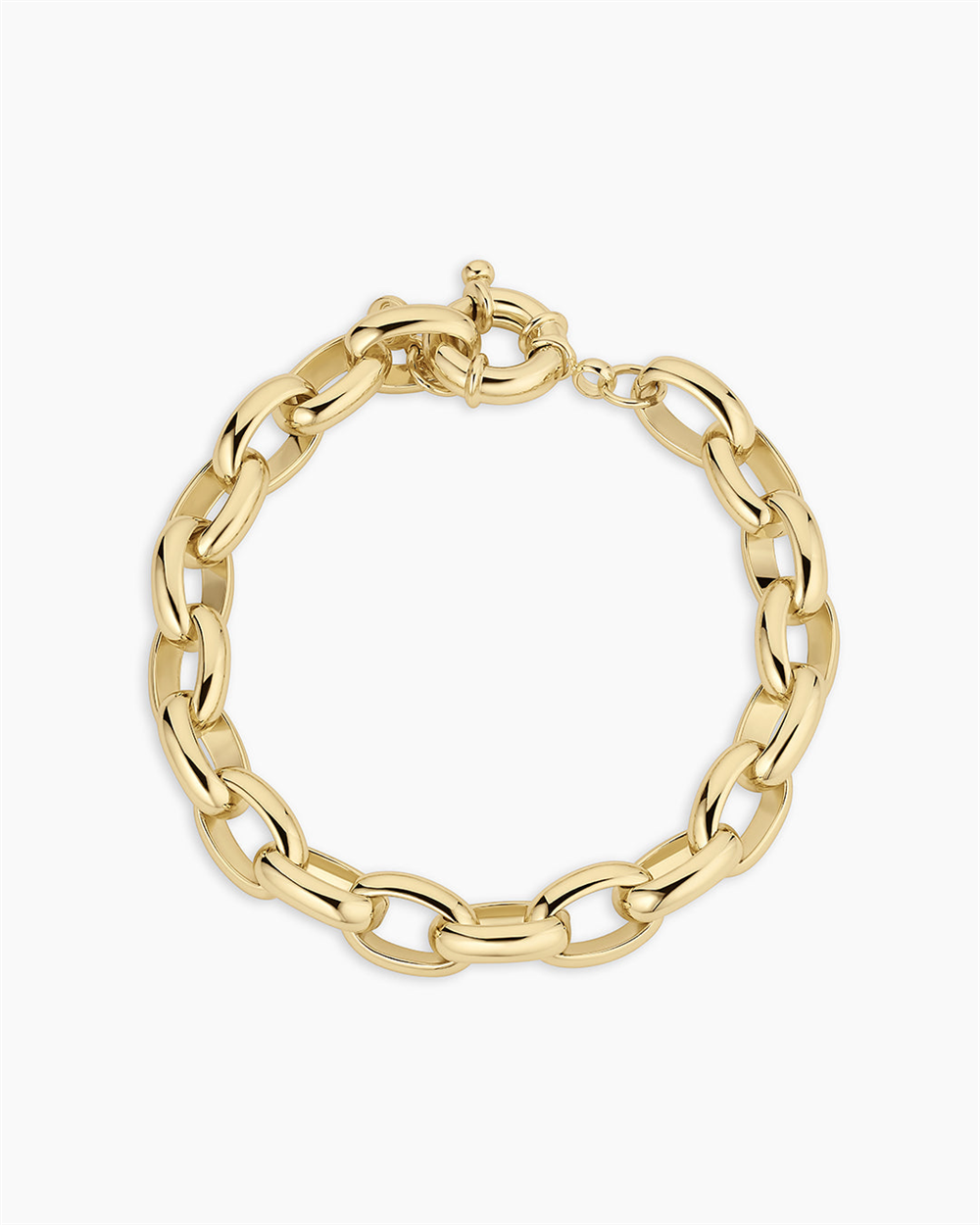 The Avery Statement Bracelet by Gorjana features thick oval links and a round clasp in 18k gold plating, shown on a plain white background.