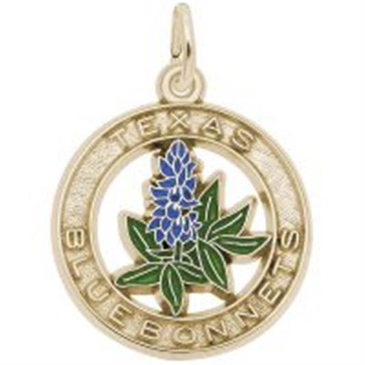 The Rembrandt Charms Gold-plated Bluebonnet charm features a bluebonnet centerpiece with blue petals and green leaves, encircled by "Texas Bluebonnets," elegantly contrasting against the gold finish.