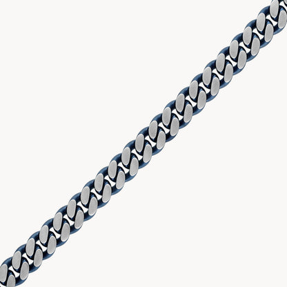 A close-up of the Bulova Watch Company Curb Chain Bracelet / Stainless Steel, a men's accessory with alternating silver and dark links, shown diagonally on a white background.