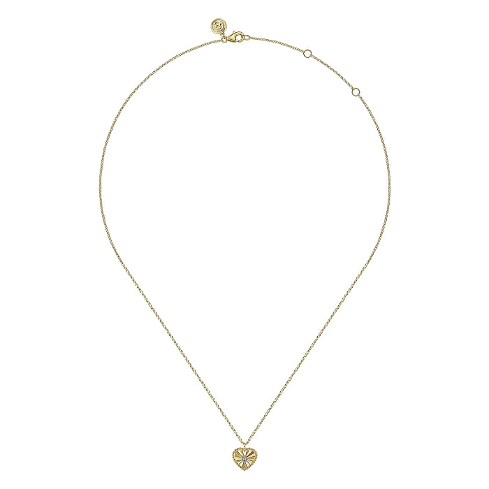 A delicate necklace from Gabriel & Co, the 14K Gold Diamond and Heart Pendant Necklace features a fine chain adorned with a small, intricately detailed heart-shaped pendant at its center. The chain showcases Bujukan beading details, a small round clasp, and offers an adjustable length option for the perfect fit.