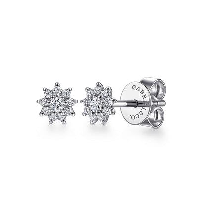 The Gabriel & Co 14K White Gold Cluster Diamond Flower Stud Earrings feature a floral design and butterfly backings, with "GABRIEL & CO." engraved on the back.