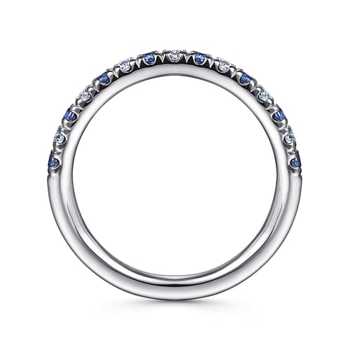 A Gabriel & Co 14K White Gold Diamond & Sapphire Anniversary Band showcases alternating sapphires and diamonds on its upper half, elegantly stacked and photographed from the side against a white background.