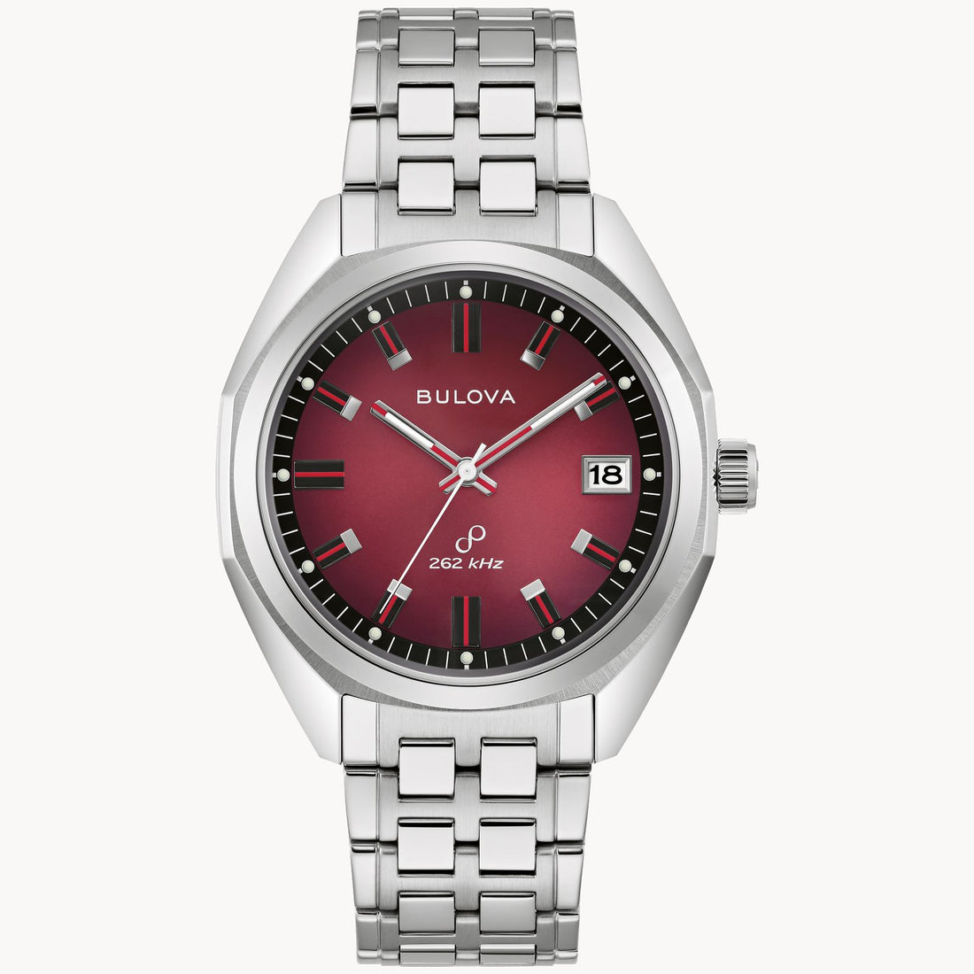 The Bulova Watch Company presents the Bulova Jet Star Watch with Maroon Dial and Stainless Steel Bracelet, featuring silver hour markers, black and red hands, and a date window at 3 o’clock for timeless style.