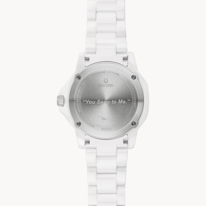 The back of a Bulova Marc Anthony Marine Star White Dial Women's Watch from Bulova Watch Company is engraved with “You Sang to Me,” along with branding details and specifications on the edge of the case back.