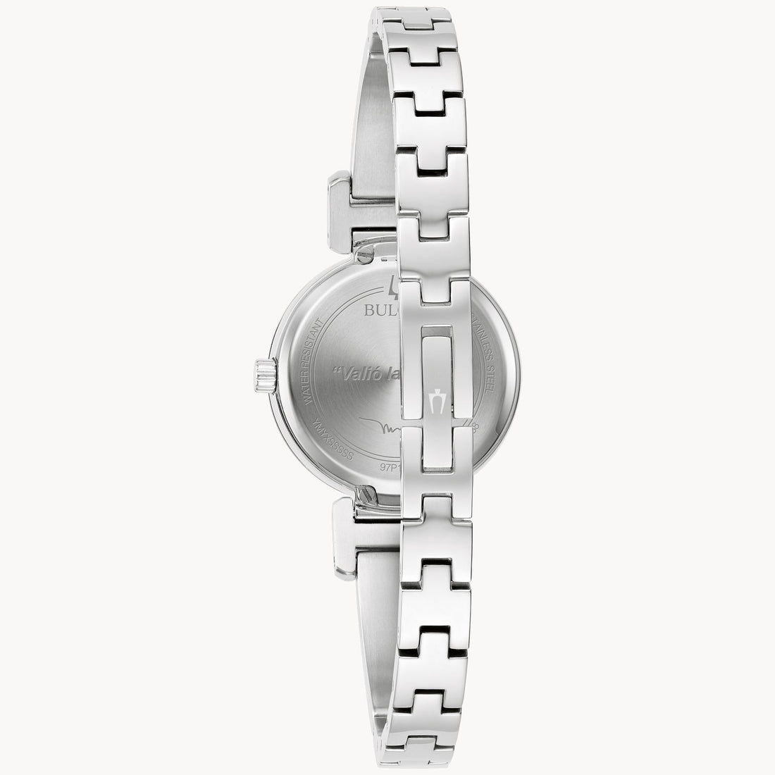 The image shows the back view of the Marc Anthony "Valió la Pena" Women's Watch with Diamonds by Bulova. This silver Bulova watch features a sleek, interlinked metal band with a secure clasp. The Bulova logo and other details are engraved on the back of the watch face, adding an elegant touch reminiscent of Marc Anthony's timeless style.