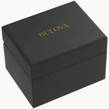 A black rectangular box with "BULOVA" in gold letters on the lid, likely packaging for a Bulova Watch Company Series X SE | Damascus Steel Watch, displayed against a white background.