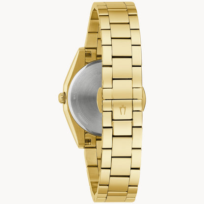 A Bulova Ladies Surveyor wristwatch is displayed from the back, featuring a polished gold-tone stainless steel bracelet, closed clasp, round silver case back, side crown, and sapphire crystal over a mother-of-pearl dial.