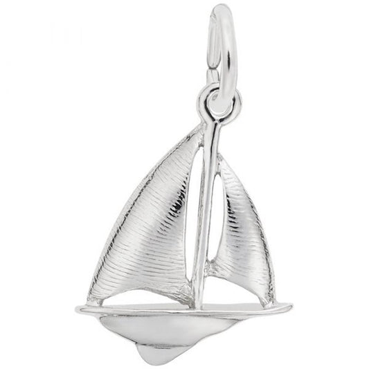 The Rembrandt Charms Sailboat Charm in sterling silver features detailed sails and a meticulously crafted hull, complete with a small loop at the top for easy attachment to jewelry. This polished charm boasts intricate texturing on the sails for a realistic appearance, all set against a plain white background.