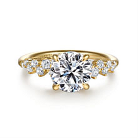 The Gabriel & Co 14K yellow diamond engagement ring (size 6.5, SN: S2079332) features a large round central diamond and accent diamonds set along each side of the band.