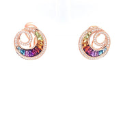 A pair of Bellarri's "Gemstones and Diamonds Earrings" crafted in 14K rose gold, featuring a circular, swirling design encrusted with genuine diamonds. The central swirl encloses a stunning array of multi-color gemstones arranged in a rainbow gradient from purple to green. The earrings are styled against a white background.
