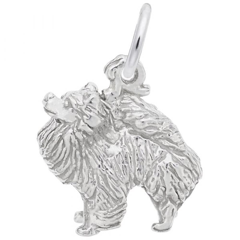 A detailed image of the Sterling Silver Pomeranian Dog Charm by Rembrandt Charms. This charm features an intricately detailed Pomeranian dog, measuring 0.48 inches by 0.48 inches (12.17 mm by 12.19 mm). The charm has a polished sterling silver finish, perfect for adding a touch of canine charm to any bracelet or necklace. Style number 1758.