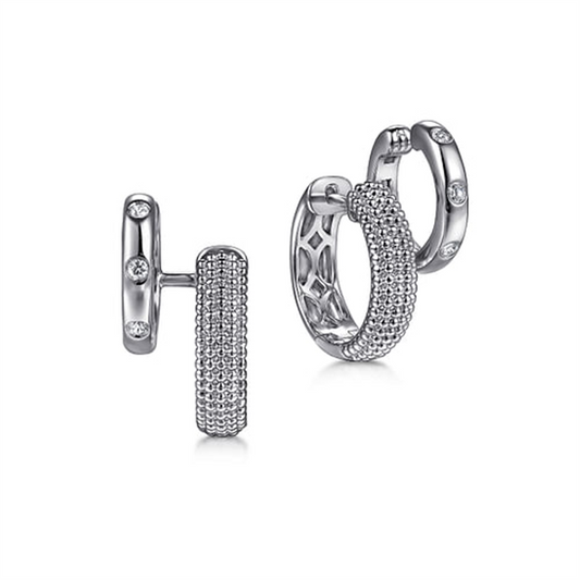 Earrings from the Gabriel & Co Bujukan collection feature a 925 Sterling silver design with white sapphire stuggies. One earring stands upright, while the other leans slightly to display the intricate detailing and reflective surface.