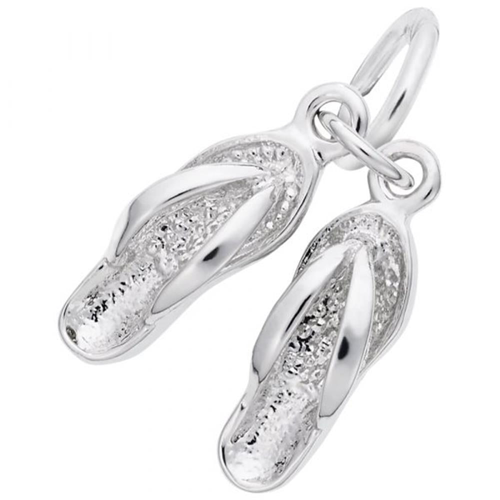 A close-up image of the Sandals Charm by Rembrandt Charms, crafted from sterling silver to resemble a pair of flip-flops. The charm features intricately detailed straps and textured soles, with a small loop at the top for attaching to a bracelet or necklace.
