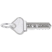 The Rembrandt Charms "Key to Success" Sterling Silver Charm is intricately crafted as a key with the words "KEY TO SUCCESS" engraved on the shaft. This elegant piece hangs from a circular keyring against a plain white background.