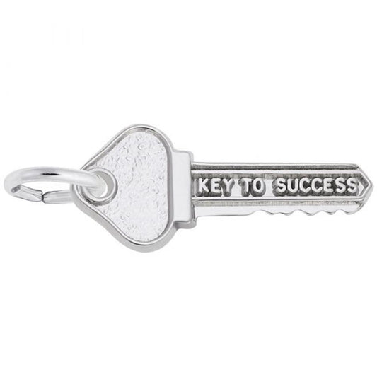 The Rembrandt Charms "Key to Success" Sterling Silver Charm is intricately crafted as a key with the words "KEY TO SUCCESS" engraved on the shaft. This elegant piece hangs from a circular keyring against a plain white background.