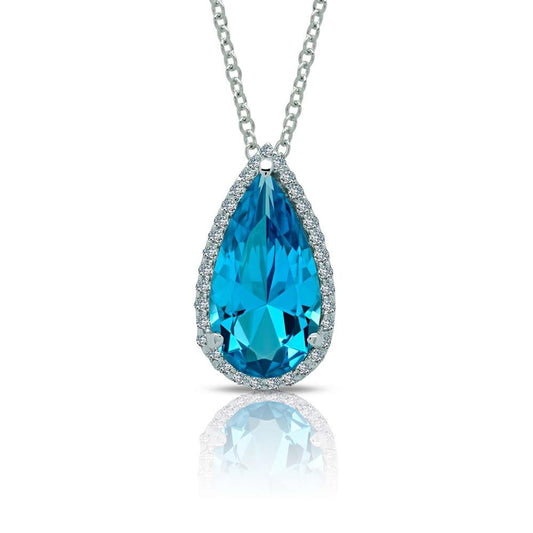 Description: The Magical Pear-Shaped Halo Necklace by Lafonn features a teardrop-shaped blue gemstone pendant encircled by a halo of Lassaire simulated diamonds, all set on a silver necklace chain. The radiant blue gem and twinkling diamonds create an eye-catching contrast. This timeless piece is beautifully reflected on the polished surface below.