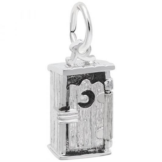 A close-up image of the Rembrandt Charms Outhouse Charm in sterling silver. The finely crafted charm features a detailed door with a crescent moon cut-out and a small latch, adding to its quaint, old-fashioned appearance. A loop is attached to the top for easy addition to a bracelet or necklace.