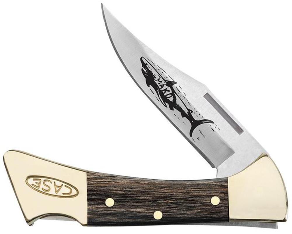 The W.R. Case & Sons Cutlery Co.'s Black Stamina Wood Smooth Mako W/ Sheath | 0169 is a folding pocket knife featuring a handle with brass details and the word "CASE" engraved on it. The stainless steel blade, partially open, boasts an etched illustration of a Smooth Mako shark and the knife comes with a protective sheath.
