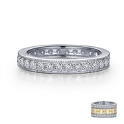 Introducing the ETERNITY BAND STACKABLE 07 by Lafonn, a stunning silver ring adorned with small, round-cut diamonds encircling its entire band. The ring features intricate detailing along the edges. Included is an inset image of a similar eternity band with alternating yellow and white diamonds set in a repeated pattern.