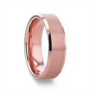 A close-up image of the Thorsten EROS Rose Gold Tungsten Wedding Band - 8mm showcases its wide band with a matte rose gold finish on the outer surface and a polished, shiny inner surface. The ring boasts a simple, modern design with clean lines and a smooth texture.