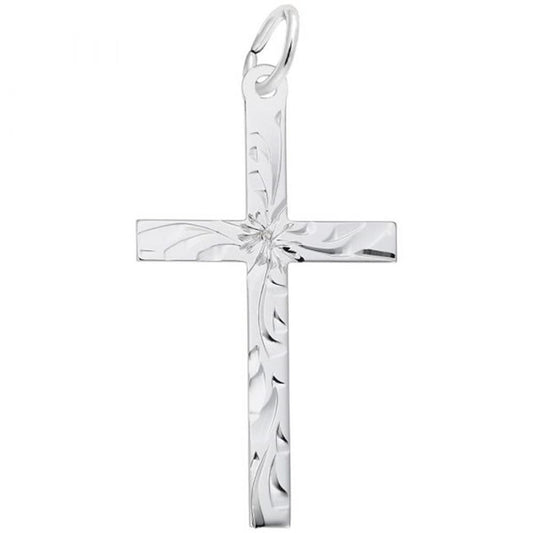 The Large Flared Cross Charm in Sterling Silver, crafted by Rembrandt Charms, showcases an intricate floral engraving at its center. It features smooth, reflective surfaces and includes a loop at the top for easy attachment to a necklace.