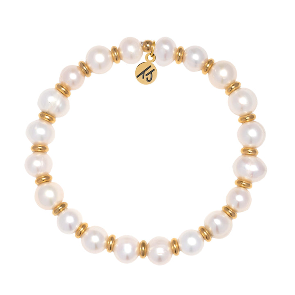 The Gold Empowered Elegance Collection- Pearl Gemstone Bracelet by T Jazelle features round white pearls with gold rings and a gold charm inscribed with "Empower.