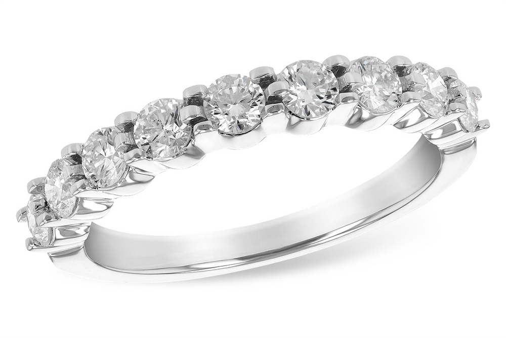 The Allison Kaufman 14k white gold wedding band showcases 0.75ct of natural diamonds, with seven round stones prong set in a sparkling row along the top.